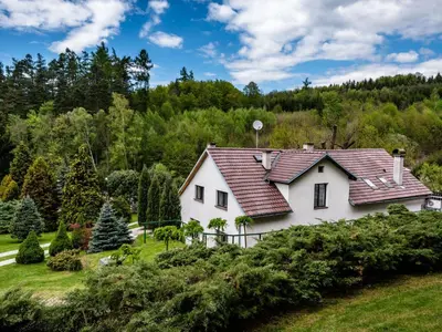 a white house with a red roof at Holiday Home Malovidy by Interhome in Rataje nad Sázavou