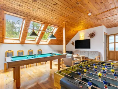 a living room with a pool table in it at Holiday Home Malovidy by Interhome in Rataje nad Sázavou