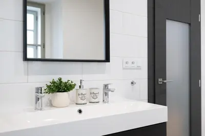 a bathroom with a white sink and a mirror at U Zlaté hvězdy Kalich in Litoměřice