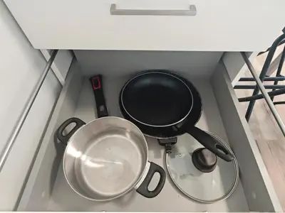 a pot and a pan sitting on top of a stove at Comfort flat with great location in Prague