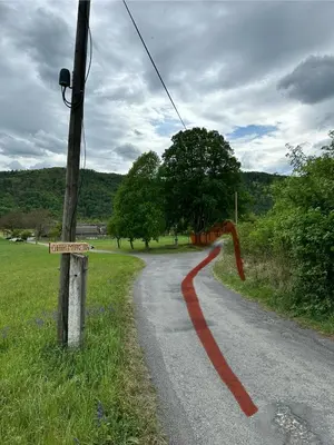 a road with a red snake on the road at Chata Markétka in Křivoklát