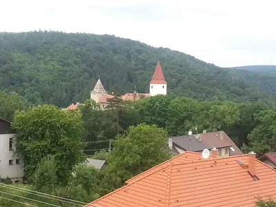 a view of a town with trees and buildings at Holiday home in Krivoklat 1156 in Křivoklát