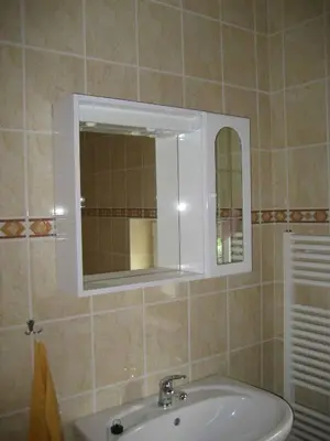 a bathroom with a sink and a mirror at Holiday home in Krivoklat 1156 in Křivoklát