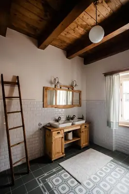 a bathroom with a sink and a ladder at Domeček v Chaloupkách in Zdice