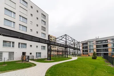 a building with a walkway between two buildings at Residence Mozaika in Prague