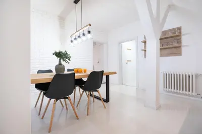 a dining room with a wooden table and chairs at U Zlaté hvězdy Zeibich in Litoměřice