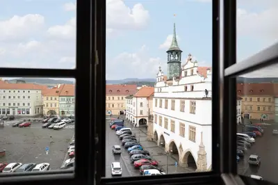 a view from a window of a building with a parking lot at U Zlaté hvězdy Zeibich in Litoměřice