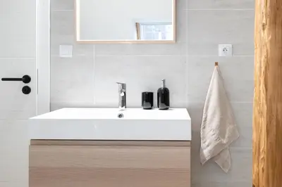 a bathroom with a white sink and a mirror at U Zlaté hvězdy Zeibich in Litoměřice