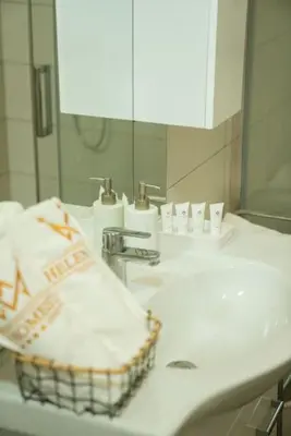 a bathroom with a sink and a mirror at Cozy flat by Wenceslas Square! in Prague