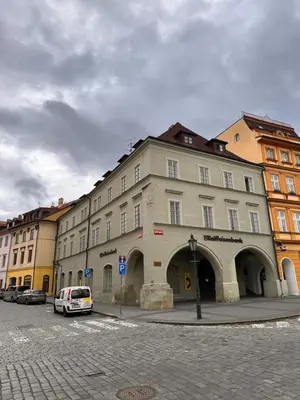 a building with a car parked in front of it at U Zlaté hvězdy Jakub in Litoměřice