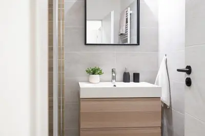 a bathroom with a white sink and a mirror at U Zlaté hvězdy Jakub in Litoměřice