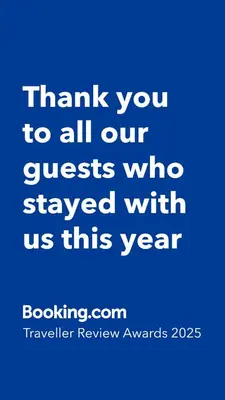 a blue background with the words thank you to all our guests who stayed with us at Riverside Palace Suites in Prague