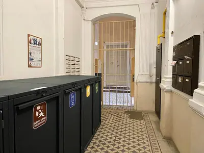 a room with a black table and a gate at Pop Art Rooms in Prague
