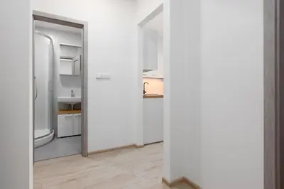 a bathroom with a toilet and a sink at 2 bedrooms apartment with kitchen near the subway in Prague