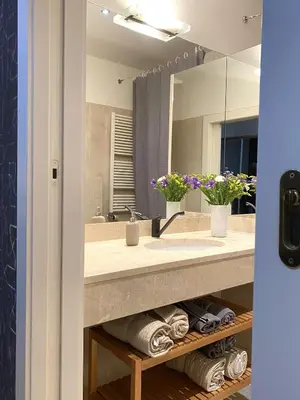 a bathroom with a sink and a mirror at Golem in Prague