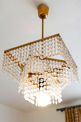 a chandelier hanging from a ceiling at Brilliant Deluxe Suite in Prague