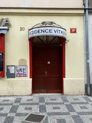 a door to a store with a sign above it at 1 Bed Flat - Sleeps 2 - Pets - Smoking on terrace in Prague