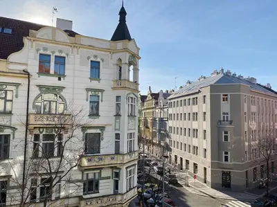 a group of buildings on a city street at Parkside Studio in Vinohrady in Prague