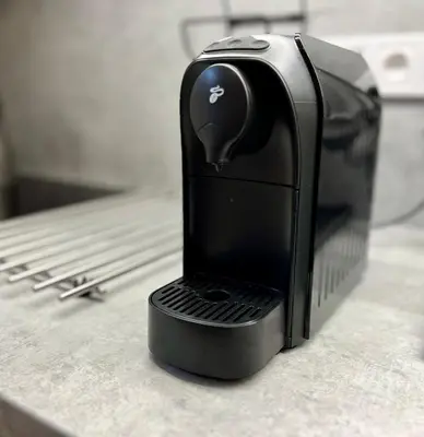 a black phone sitting on top of a counter at Pleasant Basement Apartment in Prague