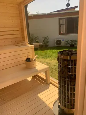 a trash can sitting next to a bench on a deck at Relax pobyt na břehu Sázavy a na dosah Prahy in Čerčany
