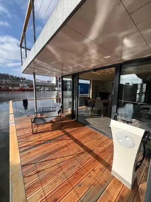 a deck on a yacht with a view of the water at Prague Stream in Prague