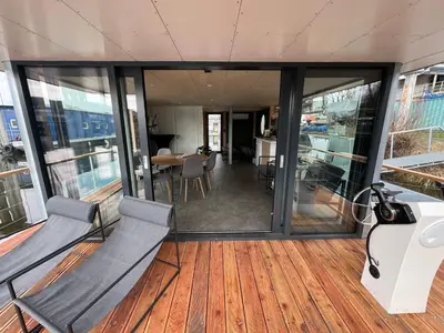 a balcony on a cruise ship with two benches at Prague Stream in Prague