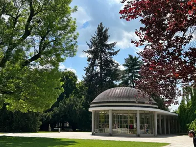 a gazebo in a park with trees at Apartmán v srdci Poděbrad 100m2 in Poděbrady