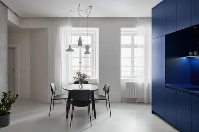 a dining room with a table and chairs at Grace Apartment by Prague Castle in Prague