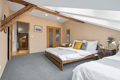 a bedroom with two beds in a room at Vintage APTs in Heart of Prague by Michal&Friends in Prague