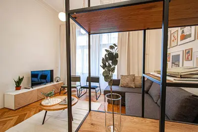 a living room with a loft bed in a room at 3BDR main square spacious designed apartment in Prague