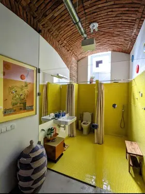 a bathroom with a sink and a toilet in it at Romantic and atypical apartments in Prague's Montmartre in Prague