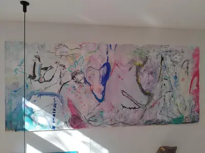 a painting on a wall with drawings on it at Romantic and atypical apartments in Prague's Montmartre in Prague