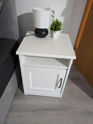 a white table with a blender on top of it at Penzion Grand Nymburk in Nymburk