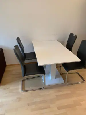 a white table and chairs in a room at Residence Garden Tower - Parking in Prague