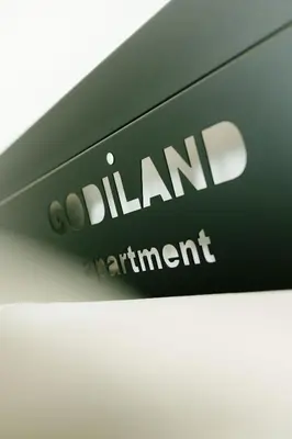 a close up of a clinton enrollment sign at Godiland Apartment in Prague