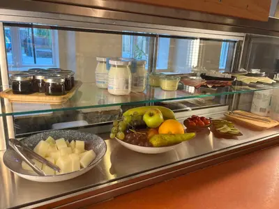 a glass counter with bowls of fruit in a kitchen at Karlštejn 34 in Karlštejn