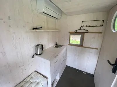 a small kitchen in a tiny house at Prague Camping Dzban in Prague