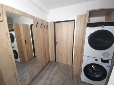 a laundry room with a washer and dryer at Relax apartmán Pod Javorem in Kladno
