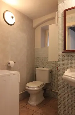 a bathroom with a toilet and a sink at Prokopska in the heart of Mala Strana in Prague