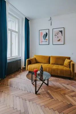 a living room with a couch and a coffee table at Bohemian Experience in Prague