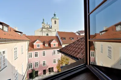 a view of the city from a window at Old Town Boutique Apartments in Prague