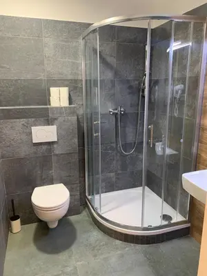 a bathroom with a shower and a toilet at Like a Hostel Prague in Prague