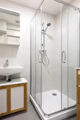 a bathroom with a shower and a sink at Apartment near the subway with a terrace in Prague