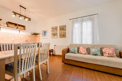 a living room with a couch and a table at Apartman Lucie in Liběchov