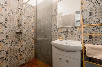 a bathroom with a sink and a shower at Apartman Lucie in Liběchov
