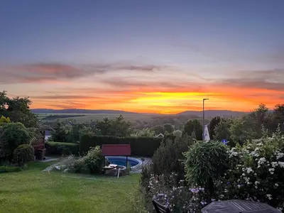 a view of a sunset from a yard at Cat’s House- Dům u třech koček in Zdice