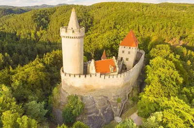 an aerial view of a castle in the forest at Apartmán Nebužely in Nebužely