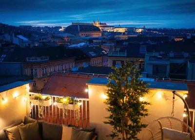 a view of a city at night with lights at 3BR AC Heaven of Harmony LUXPenthouse Theater view in Prague