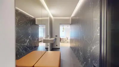 a hallway with a bench in a room at Naprstek Castle View Residence in Prague