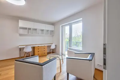 a kitchen with a table and chairs in a room at Family Friendly Spacious Two Floor B&B Prague in Prague